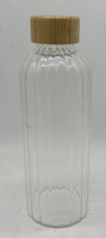 Glass bottle with bamboo lid